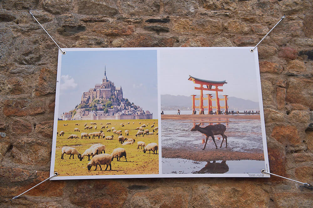 山城內牆上影展，是聖米歇爾山與日本宮島鳥居，兩者互相締結為姊妹市已經  10年了！